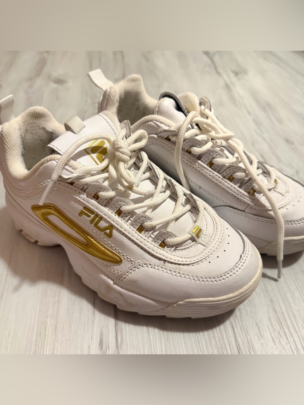 ੈ✩‧₊˚   Fila Disruptor 2 white and metallic gold chunky sneakers